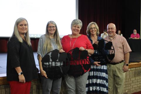 Megan Broome/The Clayton Tribune. RCPS retirees were honored at the 2020-2021 retired employee reception last Thursday. Superintendent April Childers, left, and RCPS principal Jay Fowler, right, recognize RCPS retirees, from left, Cathy Shell, paraprofessional, Merrabeth Benton, assistant principal, and Robin Hurwitz, kindergarten teacher. 