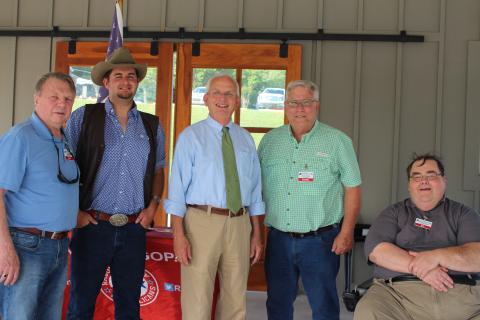 Megan Broome/The Clayton Tribune. Sam Burns, left, T.J. Dearman, chairman of the Jackson County Republican party, Gary Black, current Georgia Agriculture Commissioner, Ed Fickey, chairman of the Rabun County Republican Party, and Ed Henderson, secretary of the Rabun County Republican Party, attend the party’s ice cream social on Monday.