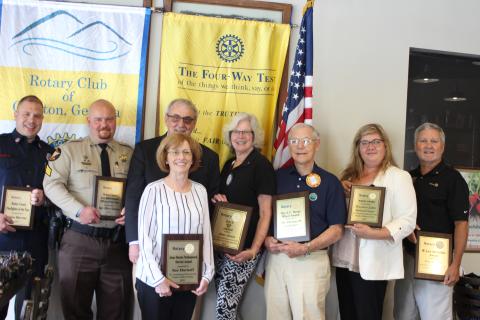 John Murray is Firefighter of the year, left, Sgt. Riley Owens is Officer of the year, Rotary Club of Clayton President Wayne Knuckles, Sue Darnell receives the Jean Harris Professional Award, Jane Janes receives the Gold R. Award, Dr. Tom Callahan receives the J.C. Dover Wheel Award, Rachel Cowart, chief nursing officer for Mountain Lakes Medical Center, receives the Wheel Award on behalf of Mountain Lakes Medical Center, and Tim Ranney receives the W. Lee Arrendale Award. 