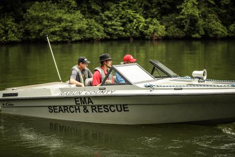 Photos courtesy of Red Bird Media. Will McCracken, chief of Rabun County Search and Rescue, left, Victor York and Chris Wright utilize the rescue boat while working the scene of a drowning incident on Lake Tugalo last 6weekend. Georgia DNR and Rabun County EMA/Search and Rescue were the lead agencies, with help from the Oconee County, S.C. Dive Team. 