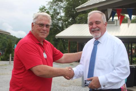 Megan Broome/The Clayton Tribune. Ed Fickey, chairman of the Rabun County GOP, shakes hands with Georgia State School Superintendent Richard Woods at a BBQ event hosted by the Rabun County Republican Party Monday. Woods was one of the guest speakers and is running for reelection in 2022. 
