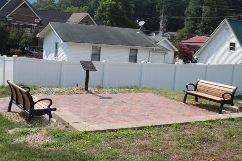 Megan Broome/The Clayton Tribune. The Charlie Mac Dickerson Sr. Memorial Park was established to honor Dickerson, who was a local business owner and community member dedicated to service. Dickerson Hardware Company was established in 1948. The park is located at 65 Wilson Alley (behind the former Dickerson Hardware Building) to honor Dickerson for his contributions to Rabun County.  The project was spearheaded by the Rabun County Downtown Development Authority.