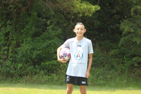 Megan Broome/The Clayton Tribune. Rabun County 11-year-old native Carlos Lopez-Justus was invited to spend 12 days in Italy to train with professional soccer coaches after attending a summer camp at the Atlanta Calcio Academy (ACA) in Habersham. Out of 34 players in the 12U group at the camp, he was the only player to be invited to Italy.