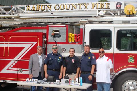 Megan Broome/The Clayton Tribune. From left are Kenneth LeCroy, consultant for Georgia Arson Control, Fire Chief James Reed, Lt. Ryan Bramblett, fire investigator for Rabun County, Assistant Fire Chief Justin Upchurch and Commissioner Scott Crane. 