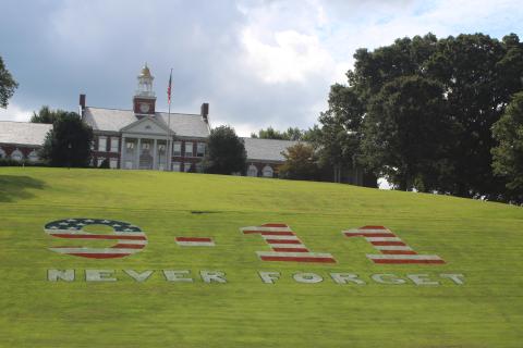 Megan Broome/The Clayton Tribune. Rabun Gap-Nacoochee School is remembering Sept. 11 with a tribute display on the front hill of the school.