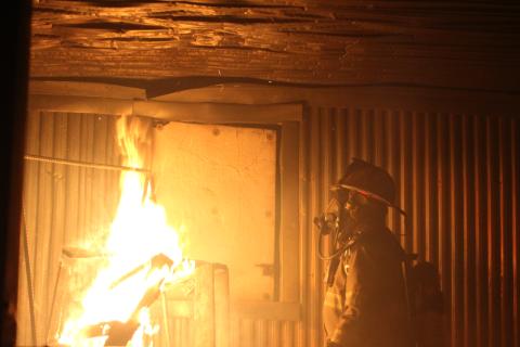 Megan Broome/The Clayton Tribune. Rabun County Fire Services recently held live fire training at their Station 4-Lakemont Wiley Training Facility. Station 4 Captain John Murray prepares the training with a simulated controlled burn that exposes firefighters to what conditions are like when responding to a structure fire. 
