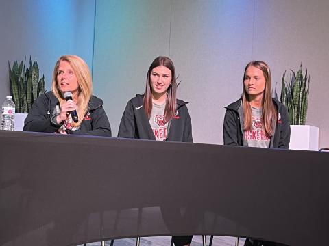 Matthew Osborne/CNI News Service Rabun County girls basketball coach DeeDee Dillard (left) responds to a question at FCA basketball media day along with players Gracie Deetz (center) and Carley Haban.