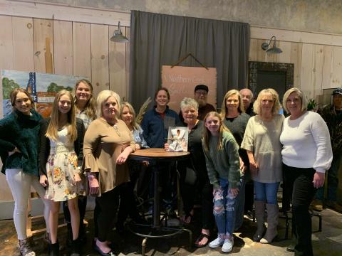 Photo courtesy of Teka Earnhardt. Several Clayton Cafe employees and community members attended the cookbook signing event on Sunday. Pictured are Cheyenne Dulucai, Chyanne Vinson, Bella Andrews, Valerie Haggerty, Lisa Shilling, Seth Curtis, Bonnie Edmonds, owner, Will Curtis, Carleigh Rae Sturm, Amy Watts, Gary Sossebee, Ranee’ Thomas, and Monica Fortson. Bonnie Edmonds and Tom Edwards are the authors of the cookbook “A Northern Cook in a Southern Kitchen."