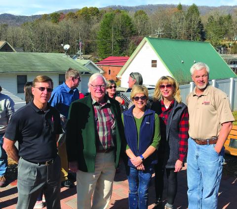 Tony Penrose/The Clayton Tribune. The Clayton DDA held a dedication of the Charlie Mac Dickerson Memorial Park Dec. 1, with city officials and community members in attendance. The park was established to honor Dickerson, who was a local business owner and community member dedicated to service. Pictured are DDA members Greg Funkhouser, left, Pepper Kelly, Cassandra Clouser, chair, Karen Bacon and Vaughn Rogers. 