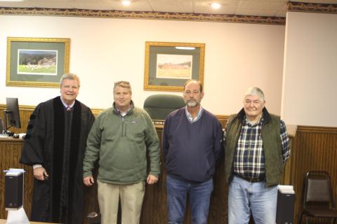 Megan Broome/The Clayton Tribune. Dillard candidates for mayor and council member positions were sworn-in to office Tuesday by Probate Judge Carlton H. Jones III in the Probate Courtroom at the Rabun County Courthouse. Probate Judge Carlton H. Jones III, left, Mayor Claude Dillard, Council Member Jeff Harris and Council Member Tremaine “Terry” Wilson pose for photographs following the ceremony. 