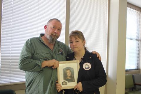 Megan Broome/The Clayton Tribune. Parents of Courtney Faith Zajdowicz, David Cross and Crystal Zajdowicz Cross, wear buttons and display a picture of Zajdowicz at the Rabun County Courthouse Tuesday, following the decision by Superior Court Judge B. Chan Caudell to grant the State’s motion to revoke bond for Jaime Avila Reyes in regard to the crash that killed Zajdowicz. Cross stated that the family is happy with Judge Caudell’s decision. 