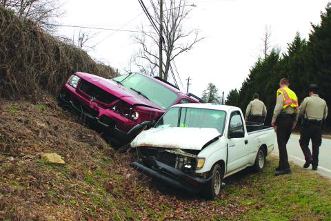 Megan Broome/The Clayton Tribune. Two vehicles collide on Georgia 15 on Jan. 13 as one of the occupants received minor injuries.