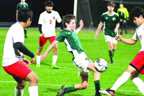 Photo courtesy of Randy Crump. Austin Ball kicks the ball in action last year for Tallulah Falls. He will be looked upon as a leader for this year's team. 
