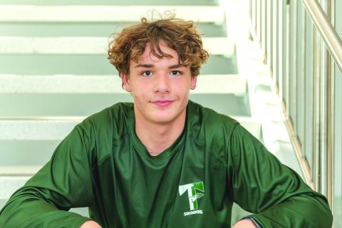 Photo by E. Lane Gresham. Emre Sungur, a freshman from Turkey, excels in pool for TFS.