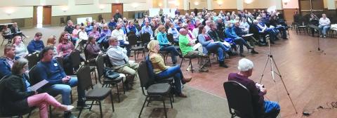 Megan Broome/The Clayton Tribune. A crowd turned out at the Rabun County Civic Center Monday night for a public forum held by the Rabun County Coalition for Good Government. The purpose was to spark participation in government and discussion on the topics related to the city of Clayton’s zoning ordinances and what is being done to minimize the impact of the 91-unit development. 