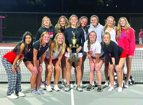 Submitted photo. The Rabun County High School girls tennis team shows off its newly earned Region 8-AA title trophy.