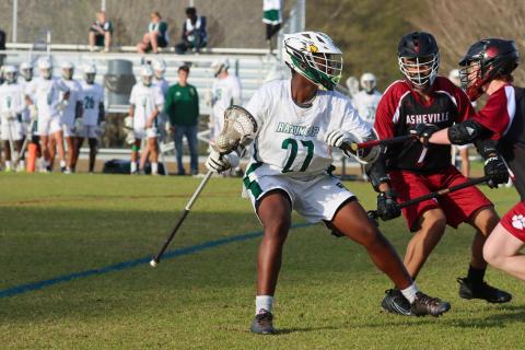 RGNS Athletics. Bryce Phillips goes on the offensive against Asheville High School.