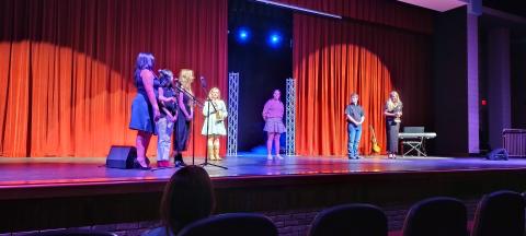 Photo courtesy of Conner Horn. Contestants in the Rabun Idol competition stand on stage after awards were presented at the Rabun County High School Fine Arts Building March 19. Hailey Smith took home the award for Judges’ Choice and Ashlynn Blackwell took home the award for Fan Favorite. Nathaniel Burrell, Kyleigh Sliker, and Emma Rose Hunter also competed in the event. Emceed for the night was Jocelyn Gaspar, Beverly Diaz and Kiley Turner. Judges were Allen Blair, Alicia Kilby and Daven Vandenberg.