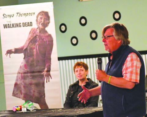 Enoch Autry/The Clayton Tribune. Dr. John Stamey talks to the audience at the Georgia Bigfoot Conference preparty on April 7 at the Rabun County Civic Center in Clayton. The conference is slated for Saturday, April 16, at the civic center. In the background is Sonya Thompson who has acted as a zombie on “The Walking Dead” TV show.