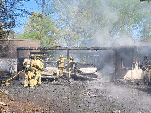 Megan Broome/The Clayton Tribune. Multi-agencies in Rabun County responded to a structure fire on Stekoa Falls Rd. in Clayton Wednesday afteroon. 