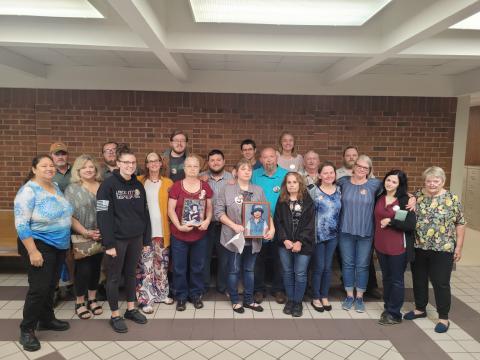 Megan Broome/The Clayton Tribune. Dozens of family members and friends of Rabun County Detention Center Officer Courtney Faith Zajdowicz donned memory buttons of Zajdowicz during Wednesday's court hearing.
