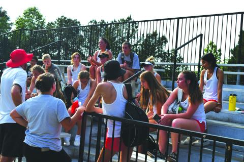 Enoch Autry/The Clayton Tribune. The Rabun County coaches Bryann Getty and Jenn Ramey talk with their Ladycat tennis players after their May 5 loss at Pace Academy  in the Class AA state Final Four. The RCHS season was the best ever for the program as the girls reached the semifinals for the first time ever.