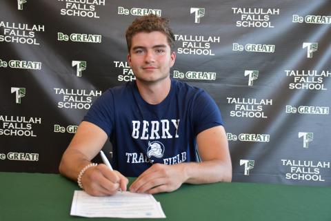 Photo courtesy Elisha Boggs. George Ketch signs with Berry College track and field.