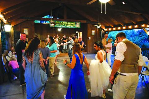 Enoch Autry/The Clayton Tribune. Guests head to the dance floor to celebrate the 100th anniversary of Lake Rabun Hotel. 