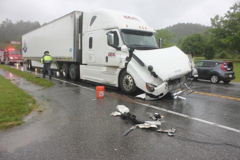 Megan Broome/The Clayton Tribune. A Georgia State Patrol trooper investigates the May 23 crash of a tractor trailer. A total of three tractor trailers were involved in the crash.