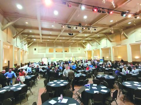 Megan Broome/The Clayton Tribune. Attendees take advantage of the Business Expo and Networking event on May 26 at the civic center.