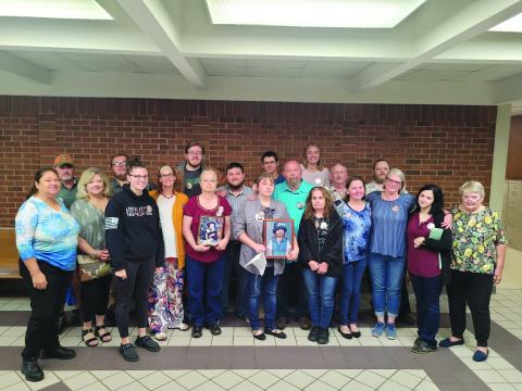 Megan Broome/The ClaytonTribune. Dozens of family members and friends of Rabun County Detention Center Officer Courtney Faith Zajdowicz donned memory buttons of Zajdowicz during the May 25 court hearing. Jaime Avila Reyes was sentenced to 15 years to serve.