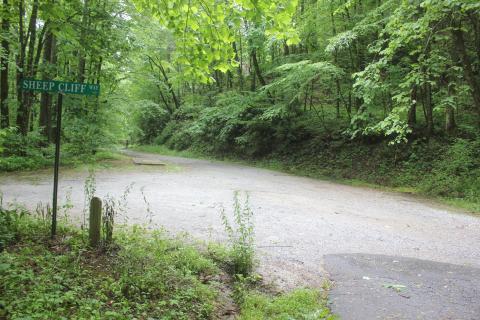 Megan Broome/The Clayton Tribune. Evergreen Road meets Sheep Cliff Way. The City of Sky Valley will soon begin paving Evergreen Road following approval by Council Members in May.