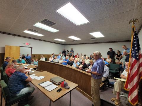 Megan Broome/The Clayton Tribune. Chip Groom, president of Lake Burton Civic Association (LBCA), speaks to the Rabun County Planning Commission in opposition of the proposed rezoning on Bridge Creek Road for the purpose of building storage units.