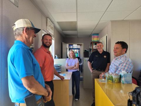 Megan Broome/The Clayton Tribune. Tyler Harper, Georgia State Senator for District 7 and Republican nominee for state agriculture commissioner, speaks with  Ricky, Clint and Melinda James of Osage, as well as Rabun County Sheriff Chad Nichols and Georgia State Sen. Bo Hatchett of District 50. 