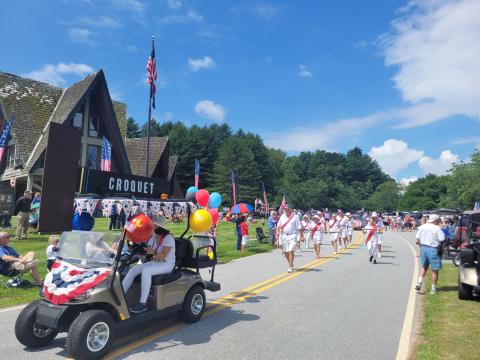 Megan Broome/The Clayton Tribune. A Sky Valley croquet team made its way through the Sky Valley Grand Parade on July 2 as part of Independence Day festivities. The croquet team chanted and danced through the parade and stopped periodically to perform a show for spectators. 