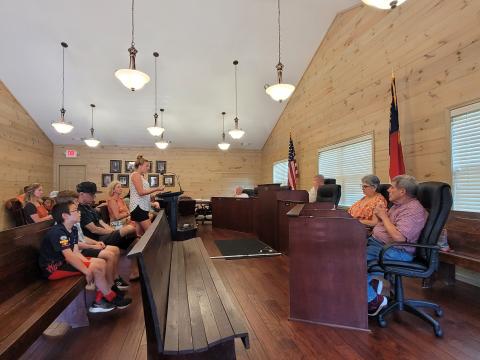 Megan Broome/The Clayton Tribune. Tiger City Council members listen to April Biagioni at last month's meeting. 