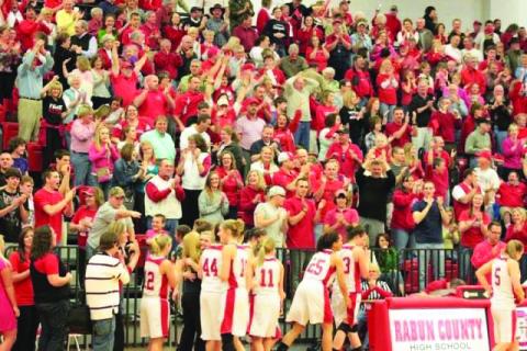 Submitted photo. A standing room-only crowd enthusiastically responds to the Lady Cats in the region tourney of 2011.