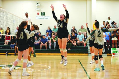 Courtesy of Austin Poffenberger. Addy McCoy (middle) celebrates as TFS varsity goes 4-0 during the week.