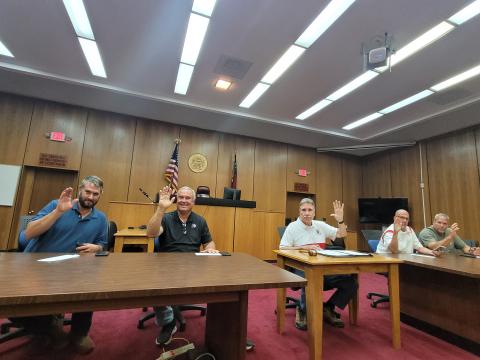 Megan Broome/The Clayton Tribune. Rabun County Commissioners vote unanimously to pass the FY 2022 millage rate of 9.928 at a special called meeting Aug. 18.