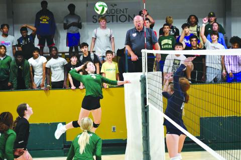 Luke Morey/The Clayton Tribune. Freshman Cassidy Klimasewski goes up for a kill against Asheville School. The Eagles fell 0-3 to Asheville. Klimasewski won the RGNS player of the week.