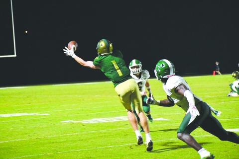 Luke Morey/The Clayton Tribune. Rabun Gap junior Trey Horne hauled in a one-handed catch that he took to the house for the game-winning touchdown.