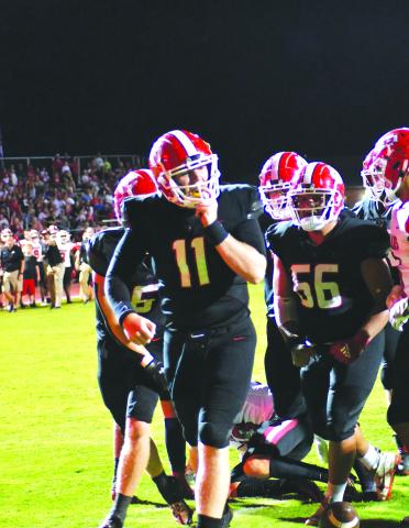 Enoch Autry/The Clayton Tribune. Senior transfer Keegan Stover rushes for a touchdown against Stephens County. Stover has 13 passing touchdowns as well as the one rushing touchdown three games into the season. 