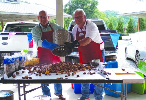 Submitted photo. Bruce Thompson, Republican candidate for labor commissioner, left, and Rabun County Republican Party President Ed Fickey, prepare for the Rabun County Republican Party’s first-ever low country boil. 