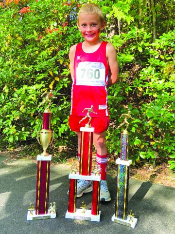 Courtesy of Ed Eidson. Kai Hanifan-Wagner, winning every meet this season, shattered the state record by 21 seconds. Last week he also earned the Highpoint championship with a perfect score of 75. 