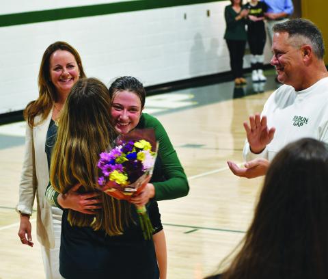 Luke Morey/The Clayton Tribune. RGNS volleyball three seniors Claren Spivey, Cheney Moriarty and Calea Jakson were honored by head coach Zoe Kennedy and Amy Westbrook on Oct. 12.