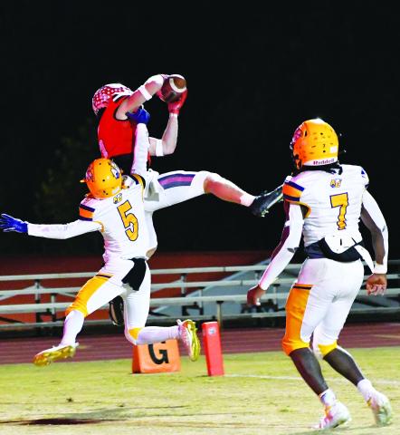 Luke Morey/The Clayton Tribune. Rabun County senior wide reciever Jaden Gibson hauls in a back shoulder fade over freshman defensive back Braxton Goolsby. Gibson had four touchdowns on the night and 115 receiving yards.