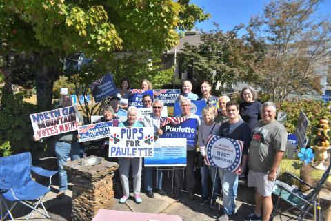 Megan Broome/The Clayton Tribune. Rabun County Democrats held a meet-and-greet community event with local party representatives and Georgia State Senate Post 50 Candidate Paulette Williams Oct. 14 at the Rock House in Clayton. The group members proudly hold campaign signs and several visitors stopped by to chat with Williams and party members about the Democrat platform and upcoming election, for which early voting is happening now. 
