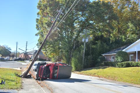 Megan Broome/The Clayton Tribune. A Georgia Power utility power pole was taken out on Hiawassee Street after it was struck by a red 2018 Jeep Wrangler Unlimited Oct. 14. The single vehicle crash resulted in no injuries, but the road was closed for a period of time following the crash. 