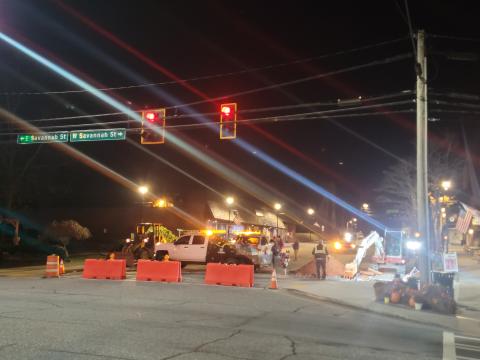 Megan Broome/The Clayton Tribune. City of Clayton workers work overnight Sunday, Nov. 13, to replace valves on Main Street in the downtown area. Workers replaced valves and a fire hydrant to improve the system. Crews worked overnight to minimize service disruption to nearby businesses. 
