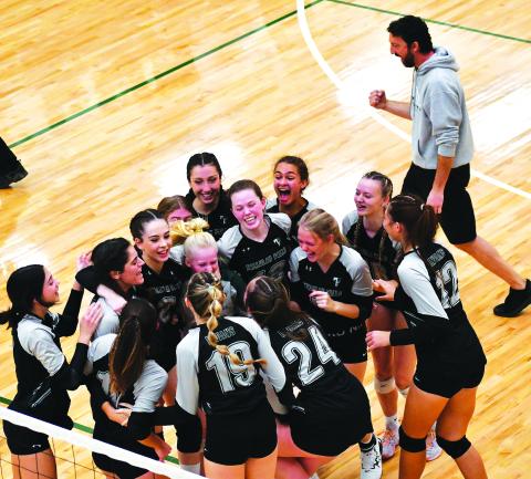 Luke Morey/The Clayton Tribune. Coach Matt Heyl and his team celebrate their first state championship apperarance in school history.